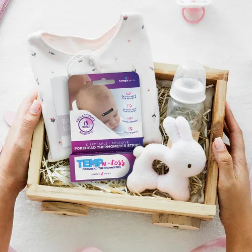 Vista 3 de Tiras de termómetro de frente desechables de lectura rápida - Temp-N-Toss para una medición precisa e higiénica de la temperatura del bebé