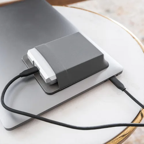 Vista 4 de Slipdrive - Funda de disco duro portátil para portátil - Unidad de disco duro HDD - Adhesivo reutilizable - Funda de transporte para disco duro Gris