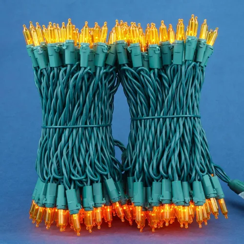 Vista 2 de Juego de 200 luces LED de Navidad, paquete de 2 juegos de 25 pies de 100 luces LED de alambre verde (naranja)