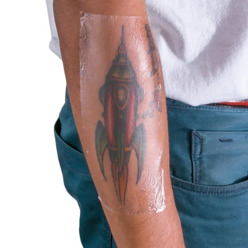 Vista 6 de Recovery Derm Shield - Rollo de vendas para el cuidado posterior de tatuajes, adhesivas, transparentes e impermeables