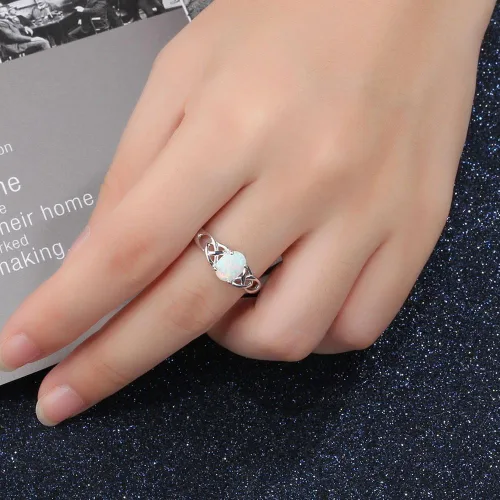 Vista 3 de Anillo de compromiso de boda de plata de ley 925 con nudo celta en forma de corazón de ópalo de fuego